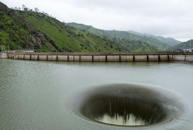 Giant hole in the middle of Lake Berryessa, in California, USA. Giant hole in the middle of a lake in California