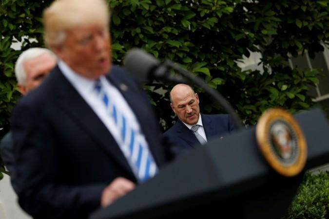 White House National Economic Council Director Gary Cohn listens as U.S. President Donald Trump speaks at an event. gary cohn