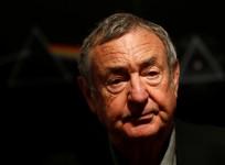 Nick Mason of Pink Floyd poses for photographers at Bonhams auctioneers in London, March 20, 2017.