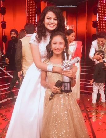 The Voice India Kids 2 winner Manashi Sahariah with singer and mentor Palak Muchhal The Voice India Kids 2 winner Manashi Sahariah