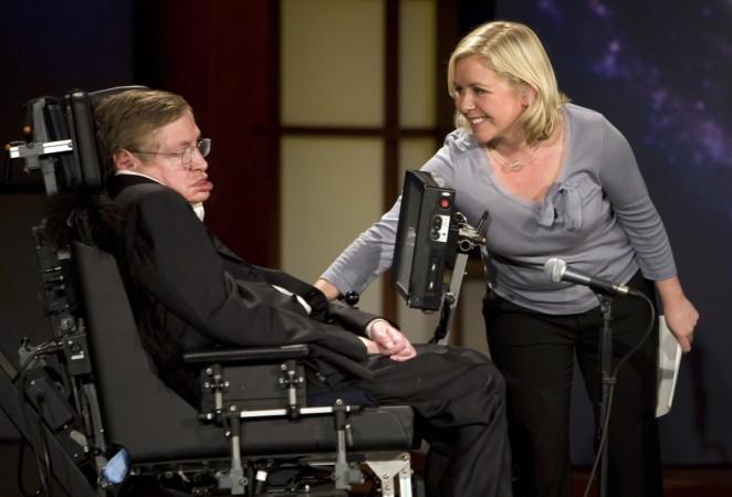 Lucy Hawking (R) touches her father Professor Stephen Hawking (L) as they give a lecture entitled 'Why We Should Go Into Space' during the 50 Years of NASA lecture series at George Washington University in Washington, DC, April 21, 2008. Stephen HAwking family, Stephen Hawking kids