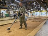 Sgt. 1st Class Jared Huffstickler, a combat engineer assigned to the Countermine Division of the Night Vision and Electronic Sensors Directorate, demonstrates how a Soldier would use real-time spatial location tracking