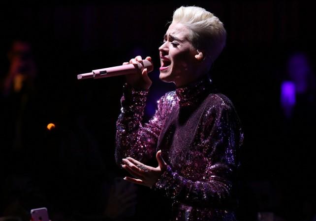 Katy Perry performs during Byron Allen's Oscar Gala Viewing Party to Support The Children's Hospital Los Angeles at the Beverly Wilshire Four Seasons Hotel Katy Perry