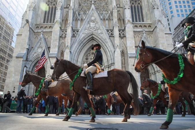 Members of the County Carlow Association ride horses as they march past St. Patrick's Cathedral on 5th Avenue during the annual St. Patrick's Day parade, March 17, 2017 in New York City. The New York City St. Patrick's Day parade, dating back to 1762, is the world's largest St. Patrick's Day celebration. Members of the County Carlow Association ride horses as they march past St. Patrick's Cathedral on 5th Avenue during the annual St. Patrick's Day parade, March 17, 2017 in New York City. The New York City St. Patrick's Day parade, dating back to 1762, is