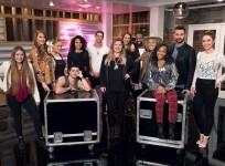Kelly Clarkson with the members of her team