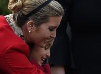 Ivanka Trump (L) hugs her daughter Arabella Rose Kushner.