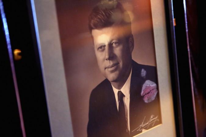 A lipstick print marks a framed photograph of former US President John F. Kennedy at the National Press Club on the same day that former Texas Governor and Republican presidential candidate Rick Perry addresses the club luncheon July 2, 2015 in Washington, DC. A lipstick print marks a framed photograph of former U.S. President John F. Kennedy at the National Press Club on the same day that former Texas Governor and Republican presidential candidate Rick Perry addresses the club luncheon July 2, 2015 in Washingt
