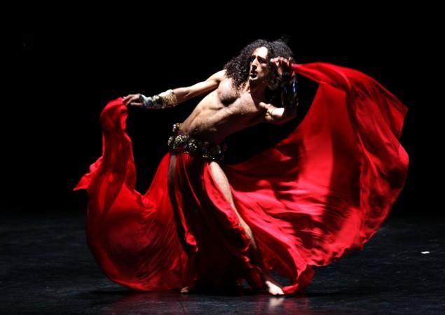 Lebanese artist Alexandre Paulikevitch dances during his 'Tajwal' (wanderings) performance at a theatre in Beirut, late on December 3, 2011. Lebanese male belly dancer