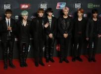Members of South Korean K-Pop band BTS pose on the red carpet during 2015 Mnet Asian Music Awards (MAMA) in Hong Kong, China, December 2, 2015.