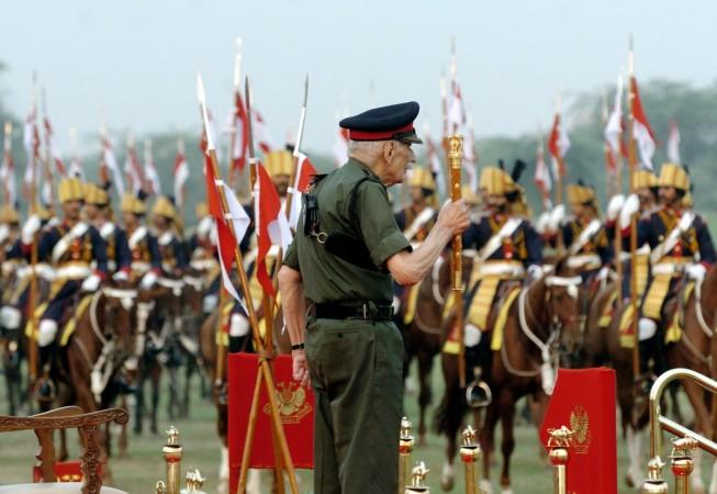 Retired field marshal Sam Manekshaw salutes at a parade in 2004. manekshaw