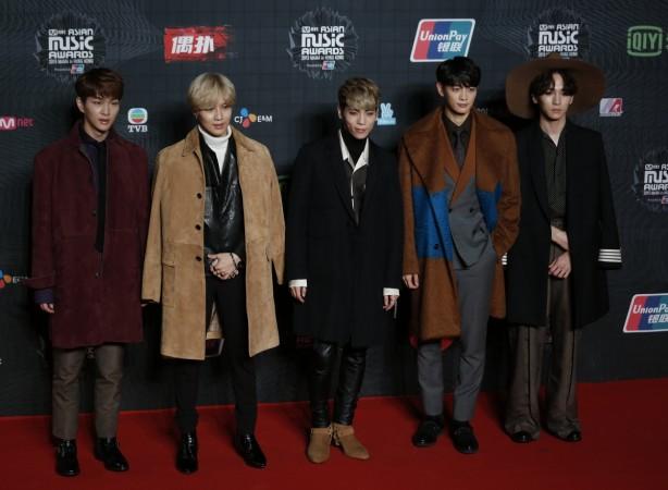 Members of South Korean K-Pop band SHINee pose on the red carpet during 2015 Mnet Asian Music Awards (MAMA) in Hong Kong, China December 2, 2015. Members of South Korean K-Pop band SHINee pose on the red carpet during 2015 Mnet Asian Music Awards (MAMA) in Hong Kong, China December 2, 2015.