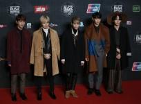 Members of South Korean K-Pop band SHINee pose on the red carpet during 2015 Mnet Asian Music Awards (MAMA) in Hong Kong, China December 2, 2015.