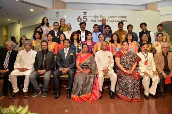President Ram Nath Kovind, Union Ministers Smriti Irani and Rajyavardhan Singh Rathore with the winners of awards at the 65th National Film Awards ceremony, in New Delhi on May 3, 2018. 65th National Film Awards
