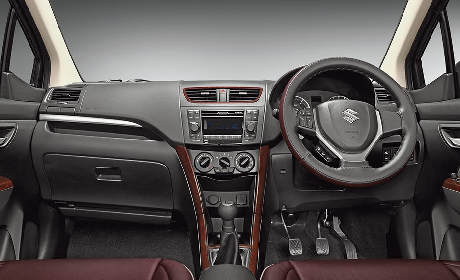 The centre console gets faux-wooden inlays and dual-tone steering wheel cover 2018 Maruti Suzuki Ertiga