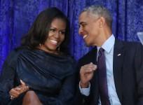 Former U.S. President Barack Obama and first lady Michelle Obama
