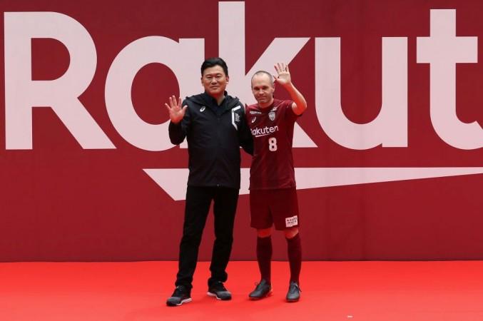 Andres Iniesta and Rakuten CEO HIroshi Mikitani pose for photographs during the fan meeting Andres Iniesta Meets Vissel Kobe Supporters
