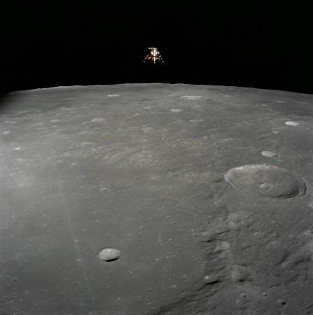 The Apollo 12 Lunar Module (LM), in a lunar landing configuration, is photographed in lunar orbit from the Command and Service Modules (CSM) on Nov. 19, 1969 Apollo 12