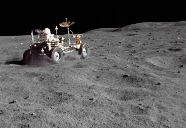 The Lunar Roving Vehicle (LRV) gets a high-speed workout by astronaut John W. Young in the Apollo 16