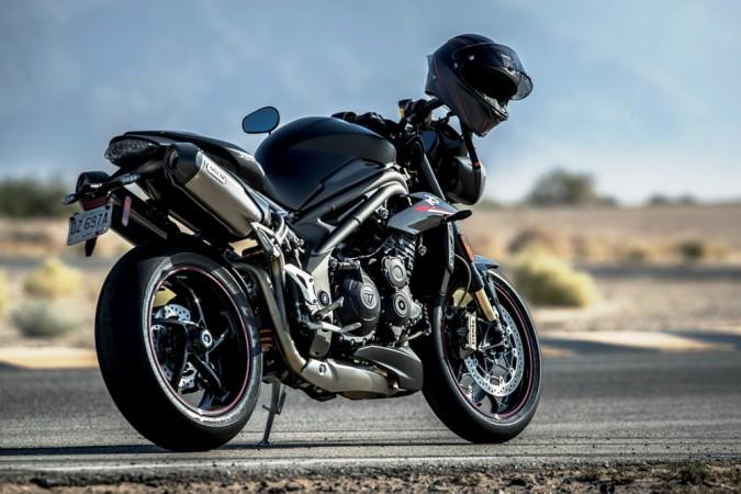 Triumph Street Triple RS employs 41mm upside down big piston front forks and fully adjustable Ohlins rear shock Triumph Street Triple RS