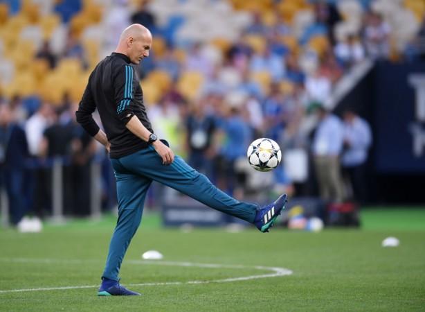 Zinedine Zidane, Manager of Real Madrid controls the ball during a Real Madrid training session Real Madrid head coach Zinedine Zidane