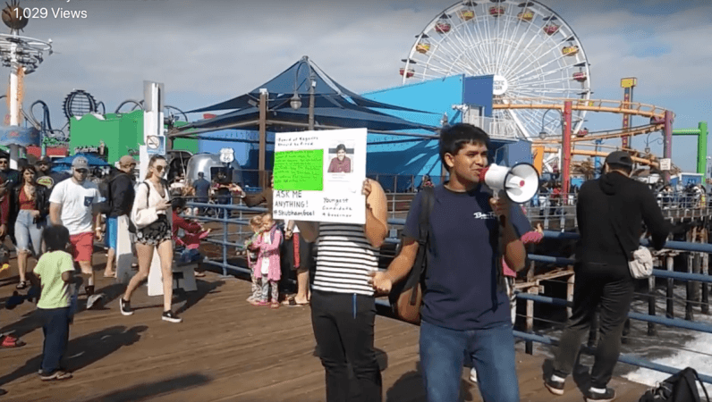 Shubham Goel campaigning over a megaphone in Santa Monica Shubham Goel