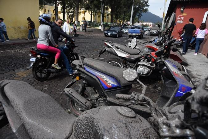 Motorcycles are covered in ash from the Fuego Volcano in Antigua Guatemala, Sacatepequez department, 45 km southwest of Guatemala City, on June 3, 2018 Guatemala volcano