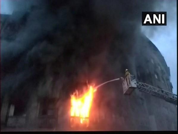 Firemen attempting to put out the inferno at Kothari Building, in Mumbai. Fire at Kothari Building