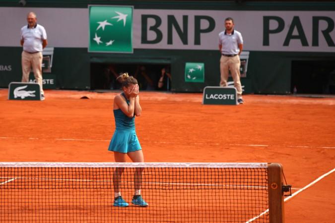 Simona Halep reacts after winning the French Open 2018 title in Paris on Saturday, June 9. Simona Halep