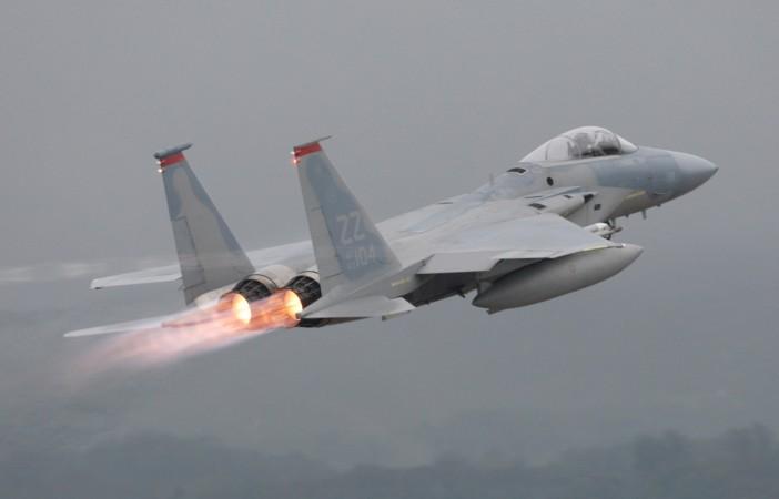 FILE PHOTO: A U.S. Air Force's F-15 aircraft takes off at Kadena U.S. Air Force Base on Japan's southwestern island of Okinawa June 16, 2009. US f-15 jet crashes in sea off Japan