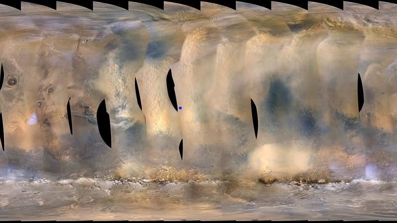 This global map of Mars shows a growing dust storm as of June 6, 2018. The map was produced by the Mars Color Imager (MARCI) camera on NASA's Mars Reconnaissance Orbiter spacecraft. The blue dot indicates the approximate location of Opportunity Mars storm