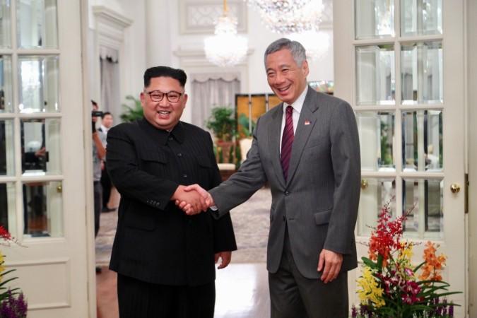 Kim Jong Un shakes hands with Singapore's Prime Minister Lee Hsien Loong at the Istana in Singapore, June 10 Kim Jong Un in Singapore