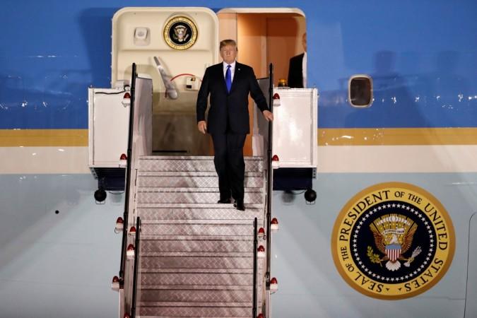 U.S. President Donald Trump steps off his plane as he arrives at Paya Lebar Air Base in Singapore Donald Trump in Singapore