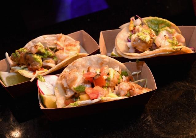 Lobster tacos are served at Guy Fieri's Vegas Kitchen & Bar booth on May 11, 2018, in Las Vegas, Nevada. Tacos