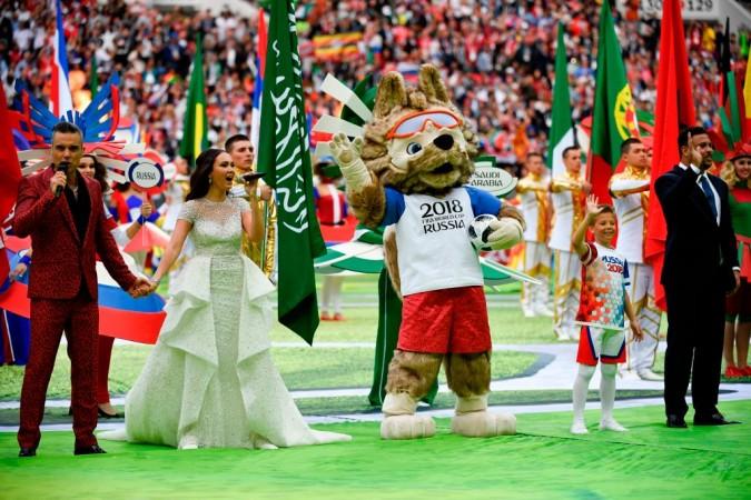 English singer Robbie Williams performs with Russian soprano Aida Garifullina as Brazilian football ledgend Ronaldo watches on at the Fifa World Cup 2018 opening ceremony. Fifa World Cup opening ceremony
