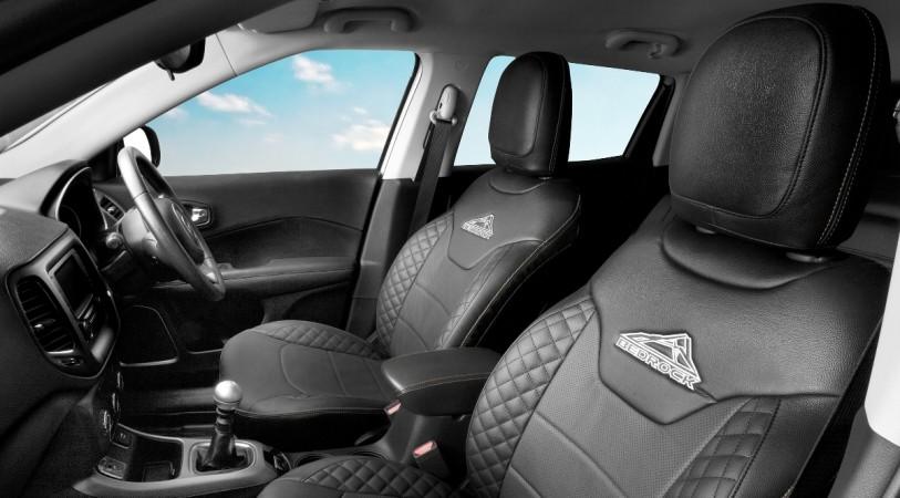 The limited edition gets Bedrock-branded seat covers Jeep Compass Bedrock