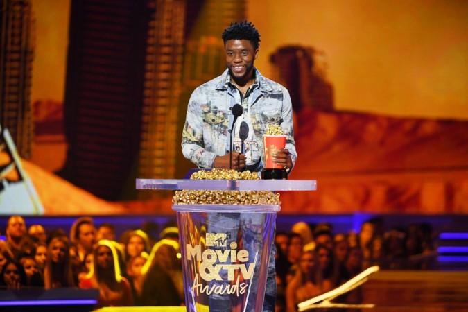 Actor Chadwick Boseman accepts the Best Performance in a Movie award for 'Black Panther' onstage during the 2018 MTV Movie And TV Awards at Barker Hangar on June 16, 2018 in Santa Monica, California. MTV movie awards, MTV Movie & TV awards 2018, Chadwick Boseman, Black Panther