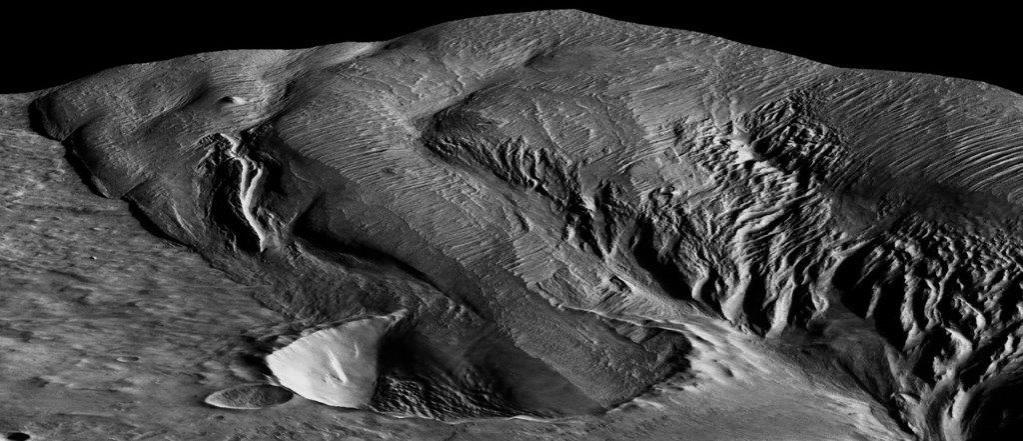 A 13-kilometer diameter crater being infilled by the Medusae Fossae Formation Medusae Fossae Formation