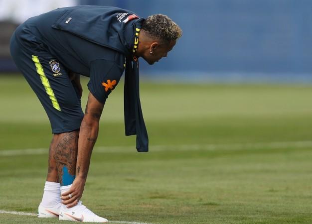 Nemar feels his ankle during a training session for Brazil Neymar Brazil injury