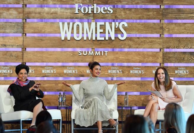 Indra Nooyi, chairman & chief executive officer, PepsiCo, Priyanka Chopra, actress, producer & activist and Moira Forbes, executive vice president, Forbes Media; publisher, Forbes Woman speak onstage at the 2018 Forbes Women's Summit at Chelsea Pier on June 19, 2018 in New York City. Priyanka Chopra, Indra Nooyi