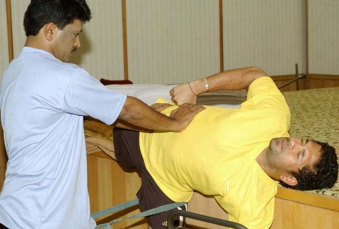 Dr SN Omkar with the Indian cricket team in 2003. SN Omkar International Yoga Day