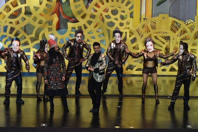 Bollywood actor Ritesh Deshmukh (L) and director/producer Karan Johar (R) host the IIFA Awards of the 19th International Indian Film Academy (IIFA) festival at the Siam Niramit Theatre in Bangkok on June 24, 2018. Karan Johar and Riteish Deshmukh