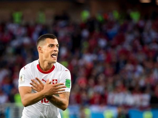 Granit Xhaka of Switzerland celebrates after scoring his team's first goal during the 2018 FIFA World Cup Russia. Switzerland's players Shaqiri and Xhaka are fined for their goal celebrations but will still be able to play games