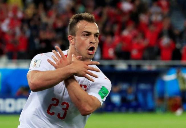Xherdan Shaqiri of Switzerland celebrates after scoring his team's second goal during the 2018 FIFA World Cup Russia Switzerland's players Shaqiri and Xhaka are fined for their goal celebrations but will still be able to play games
