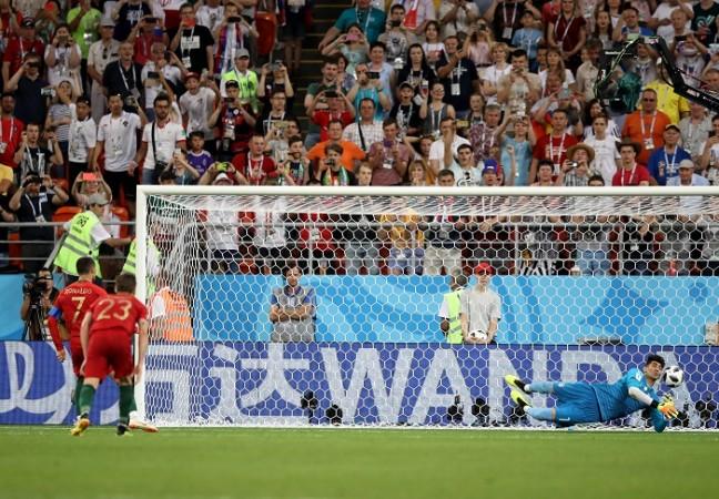 Cristiano Ronaldo has his penalty saved by the Iran goalkeeper Cristiano Ronaldo Portugal Iran penalty