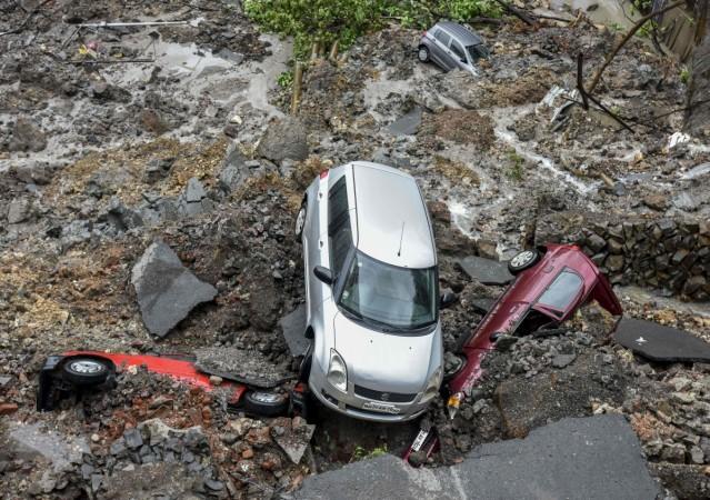 Several cars were buried in the debris. mumbai rains