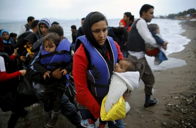 Afghan immigrants land at a beach on the Greek island of Kos Afghan immigrants land at a beach on the Greek island of Kos