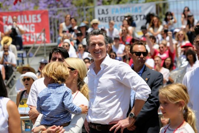 California Lieutenant Governor Gavin Newsom and his family attend a national day of action called California Lt governor Gavin Newsom at anti-trump protest