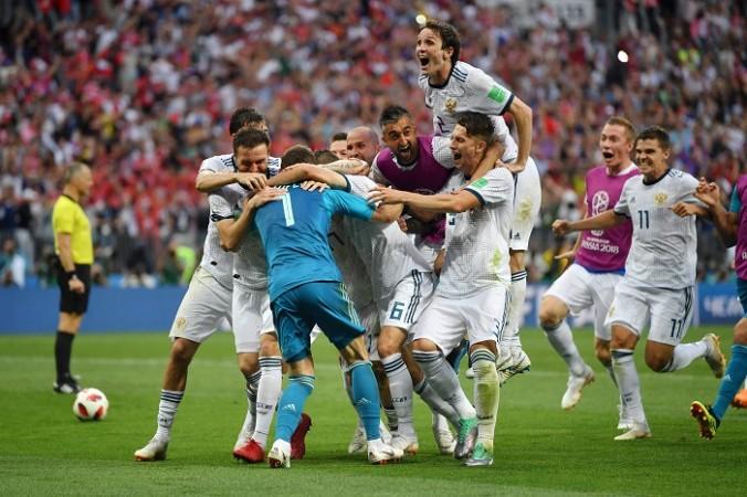 Igor Akinfeev, the Russia hero, is mobbed by his team-mates Igor Akinfeev Russia Spain