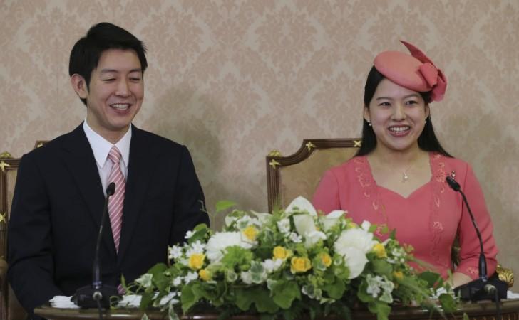 Japanese Princess Ayako (R), the third daughter of the late Prince Takamado, and her fiance Kei Moriya attend a press conference to announce their engagement at the Imperial Household Agency in Tokyo on July 2, 2018. Princess Ayako and her fiance Kei Moriya