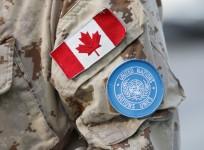 A Canada flag patch and U.N. patch